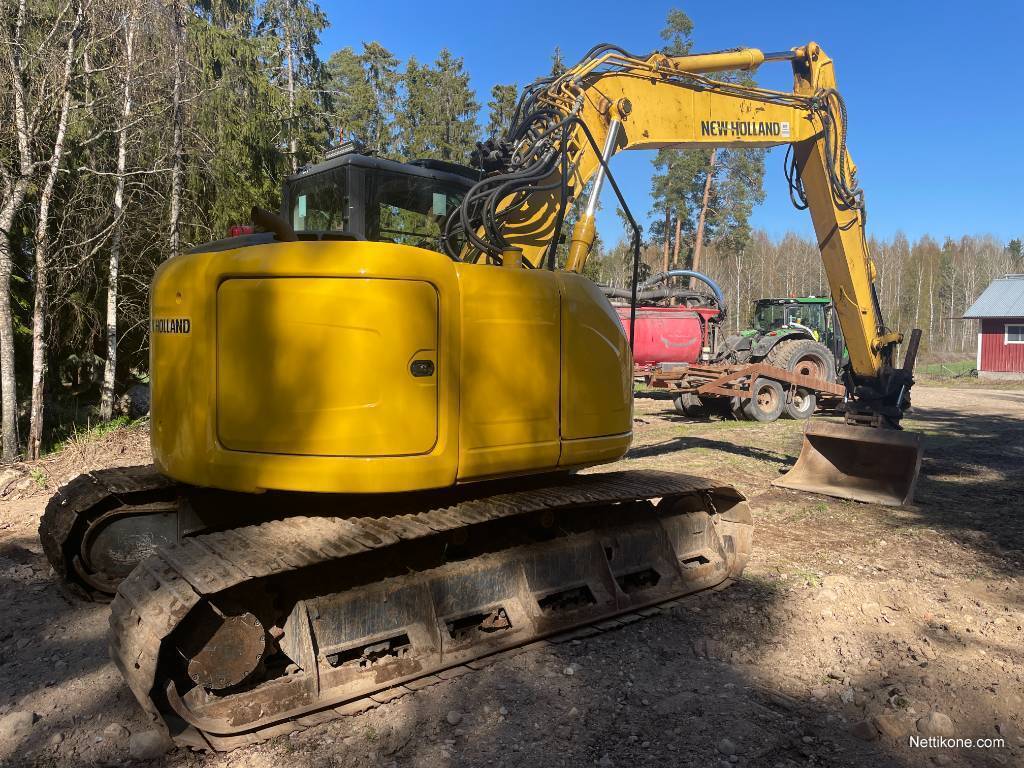 New Holland E 140 C SR Kaivinkone 2015 Nettikone